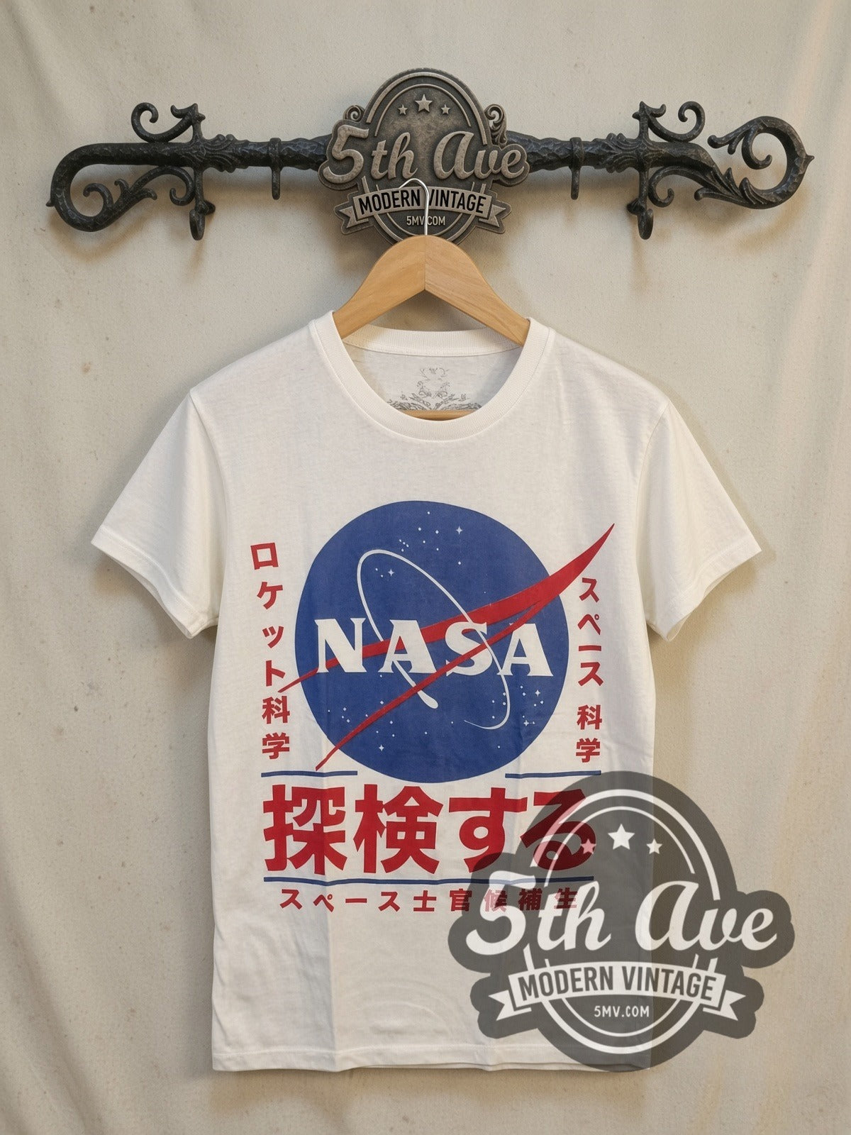 NASA Japanese Logo graphic tee in white, front view on a display rack