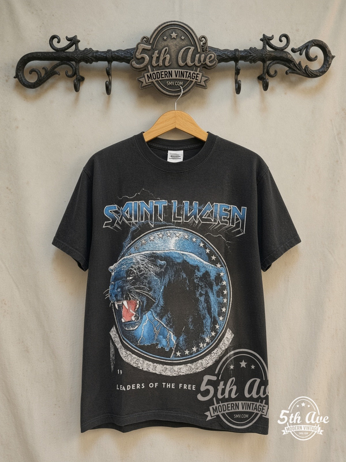 Saint Lucien – FEEL WILD – Vintage Graphic Tee — front on locked cream ornate 5th Ave rack