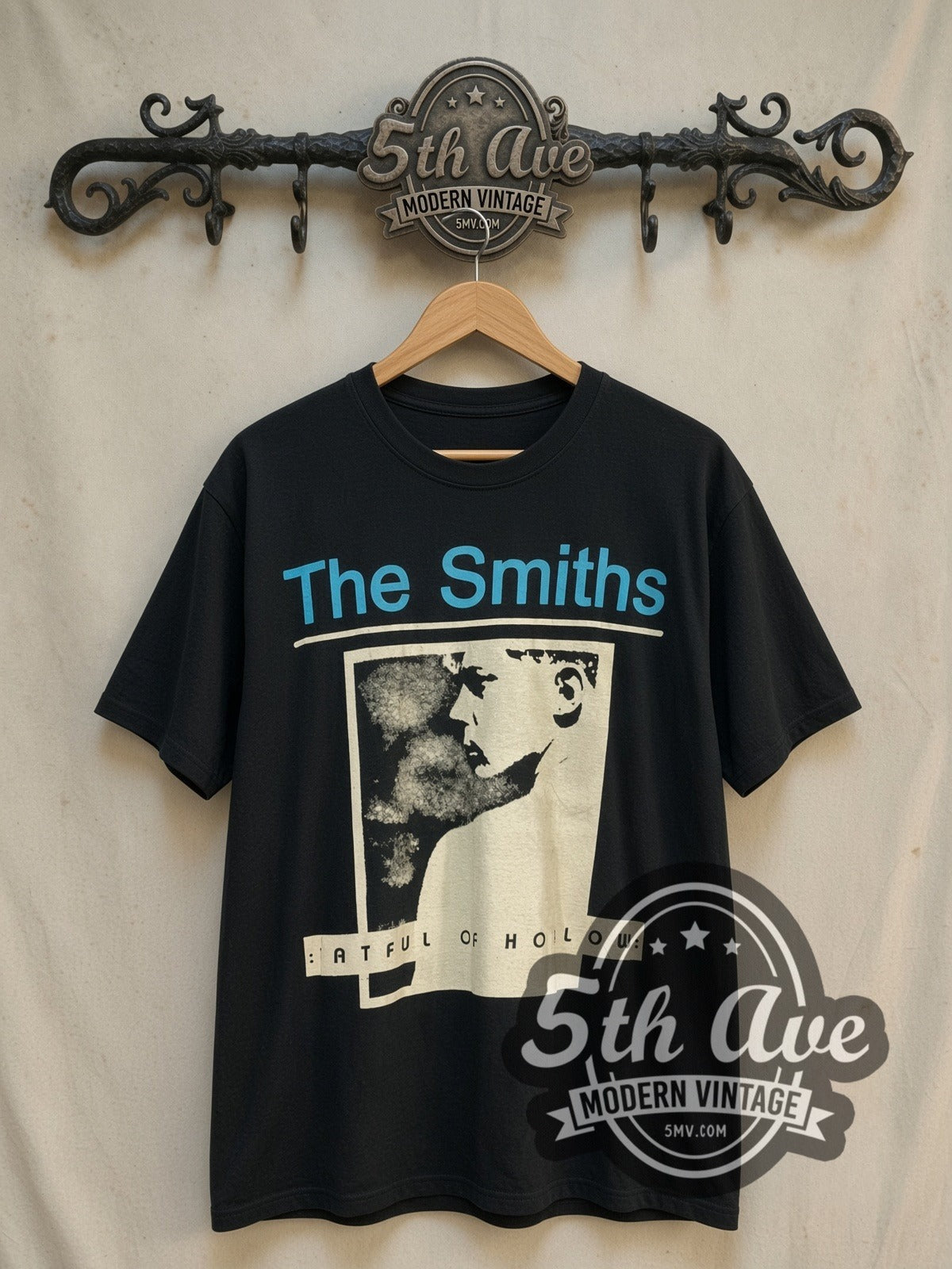 The Smiths Hatful of Hollow Blue Header Portrait vintage band t-shirt, front view on a display rack
