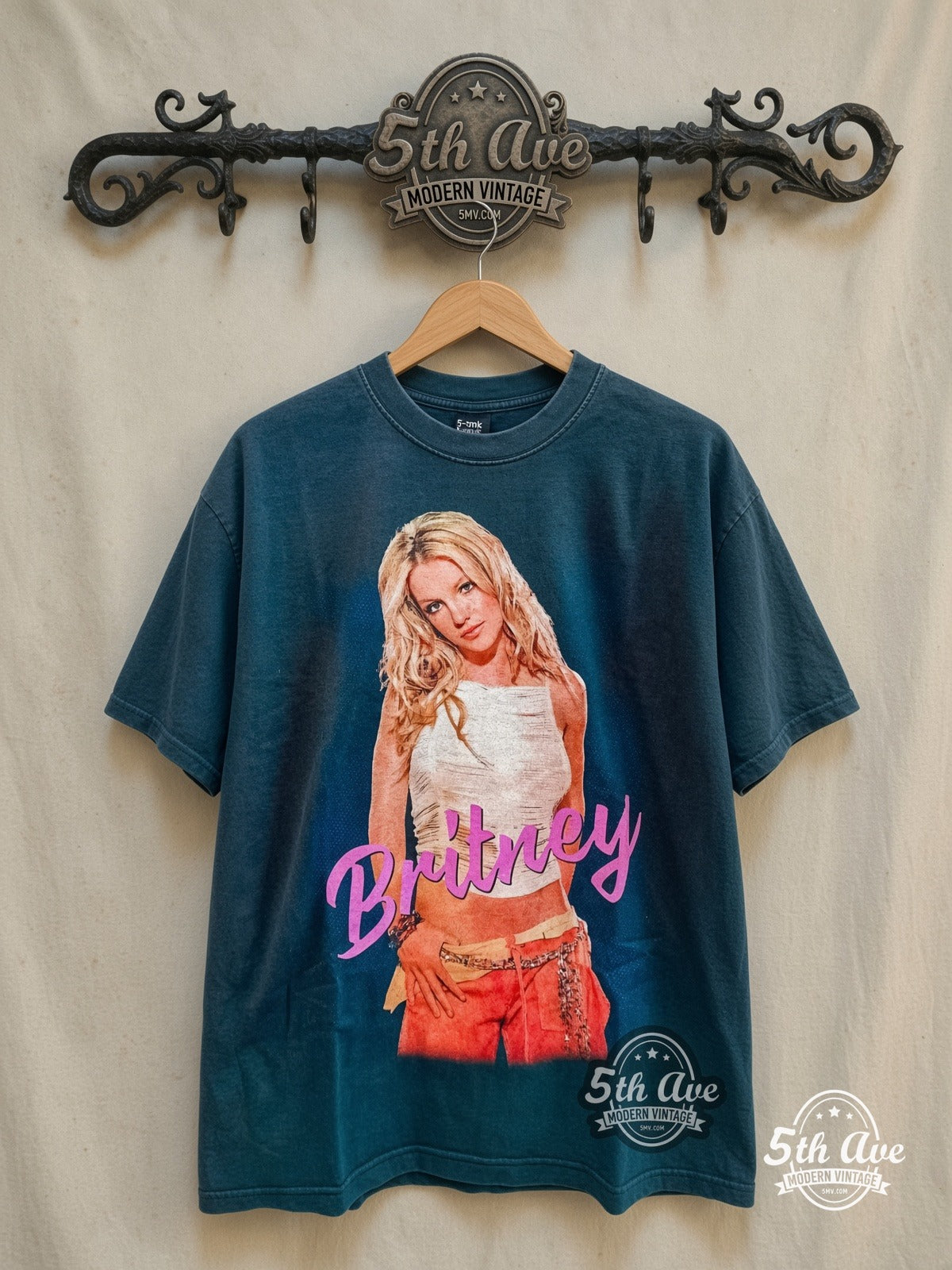 Britney Spears – Oops!... I Did It Again Tour 2000 – Vintage Band T-Shirt — front on locked cream ornate 5th Ave rack
