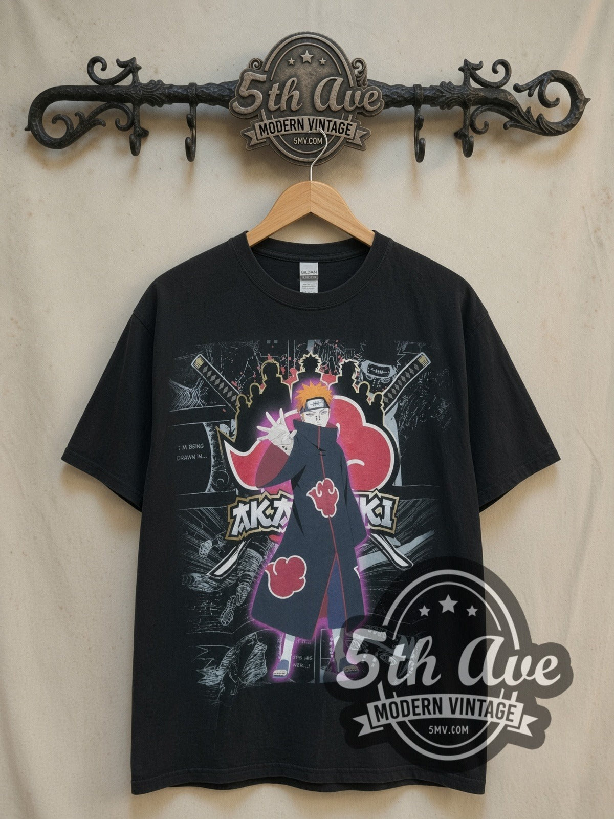 Naruto Shippuden Akatsuki vintage graphic t-shirt, front view on a display rack
