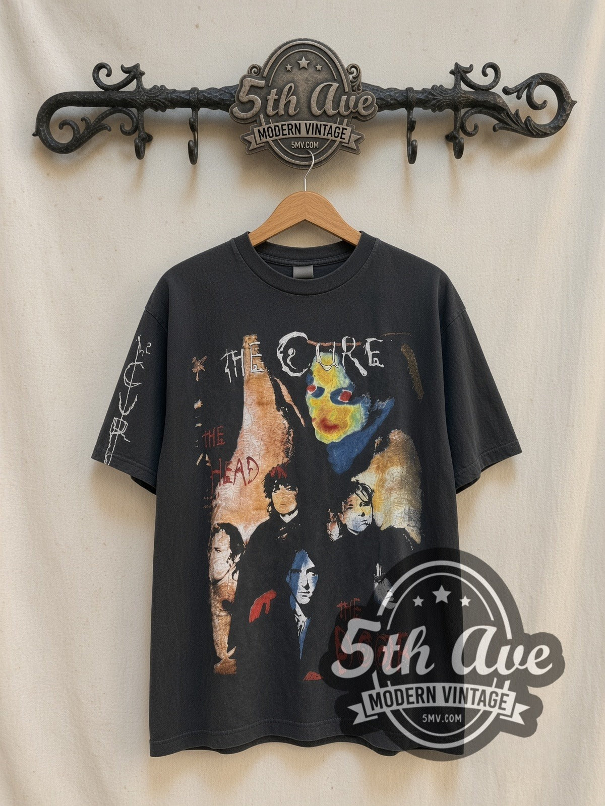 The Cure The Head on the Door Long Sleeve vintage band t-shirt in black, front view on a display rack