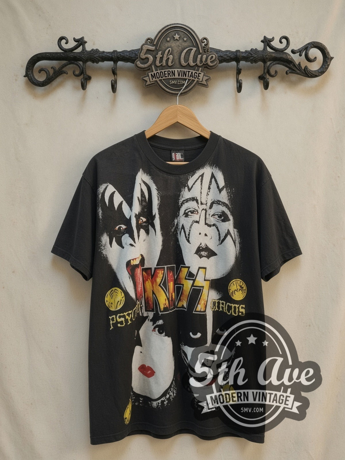 KISS Psycho-Circus 1999 Mexico all-over-print vintage band t-shirt, front view on a display rack