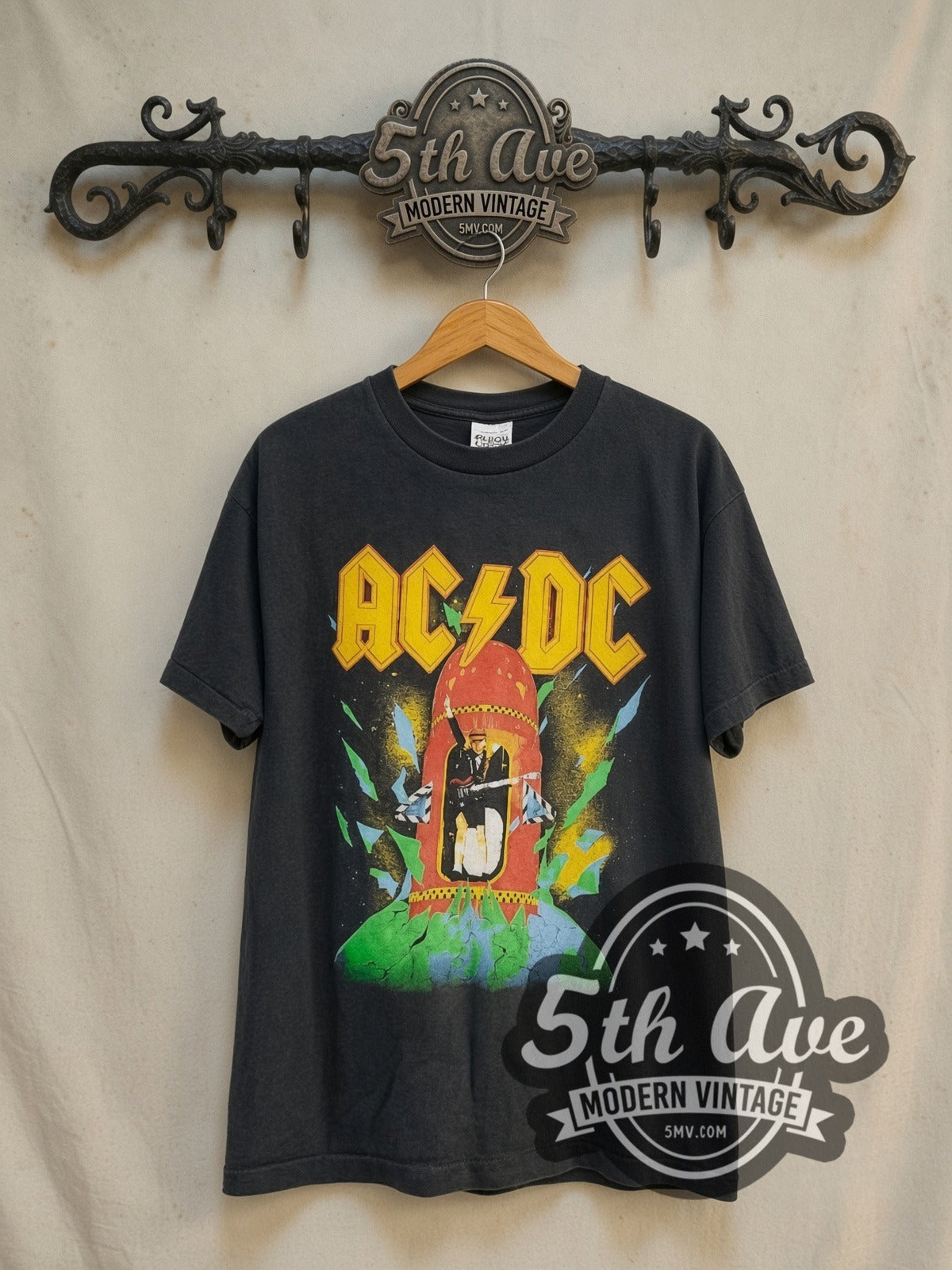 AC/DC Blow Up Your Video Red Rocket Blimp vintage band t-shirt in black, front view on a display rack