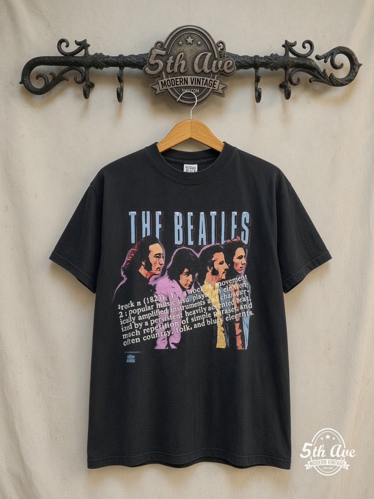 The Beatles – Definition of Rock – Vintage Band T-Shirt — front on locked cream ornate 5th Ave rack