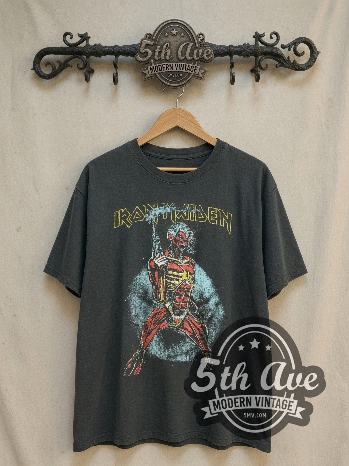 Iron Maiden Somewhere on Tour 1987 vintage band t-shirt, front view on a display rack