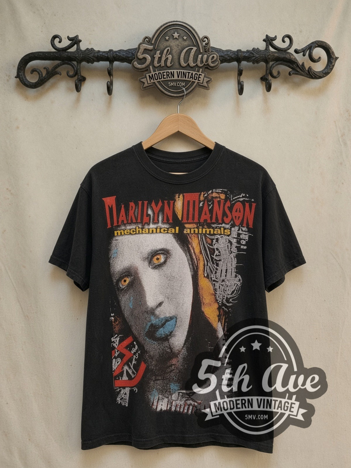 Marilyn Manson Mechanical Animals Blue Lips vintage band t-shirt, front view on a display rack