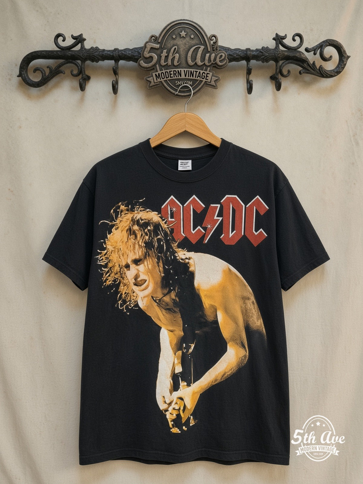 AC/DC – Angus Young Guitar Solo – All Over Print – Vintage Band T-Shirt — front on locked cream ornate 5th Ave rack