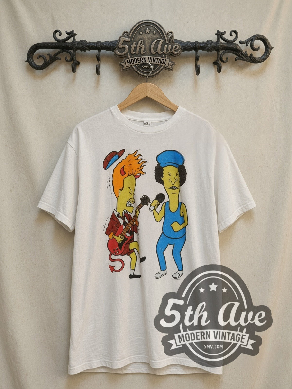 AC/DC / Beavis and Butt-Head Cartoon Crossover vintage cartoon tee, front view on a display rack