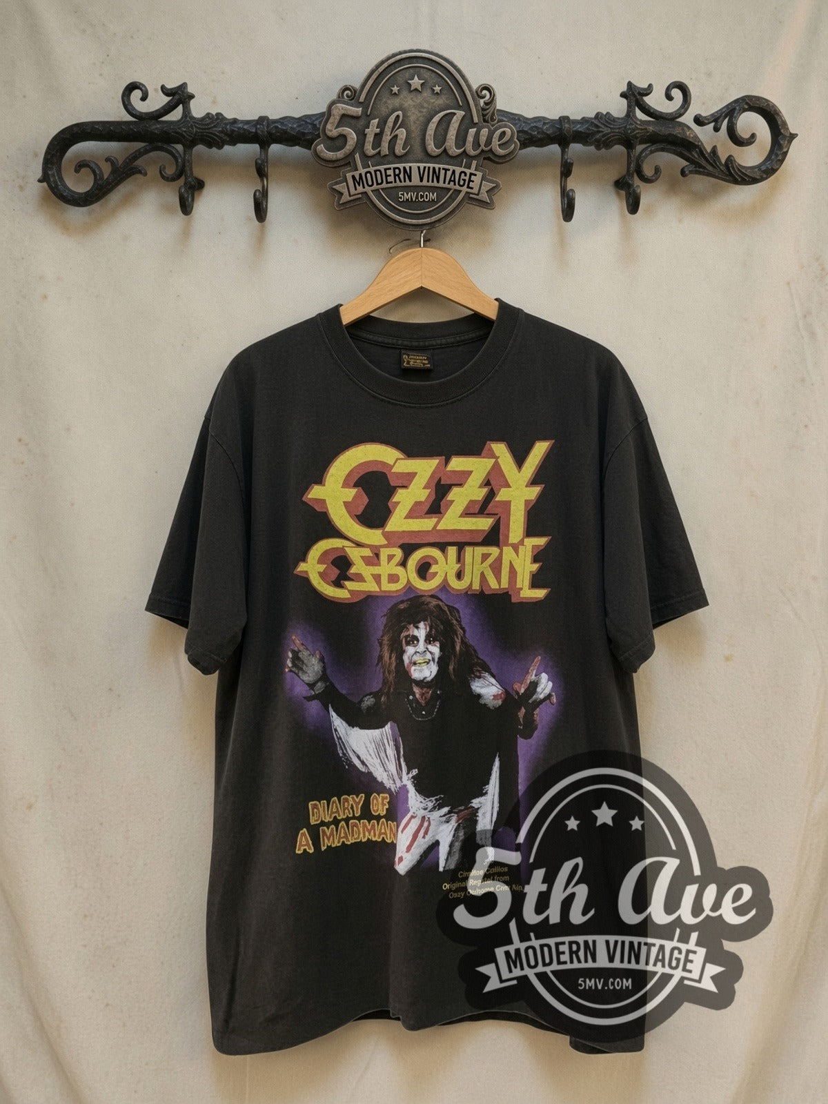 Ozzy Osbourne Diary of a Madman vintage band t-shirt, front view on a display rack