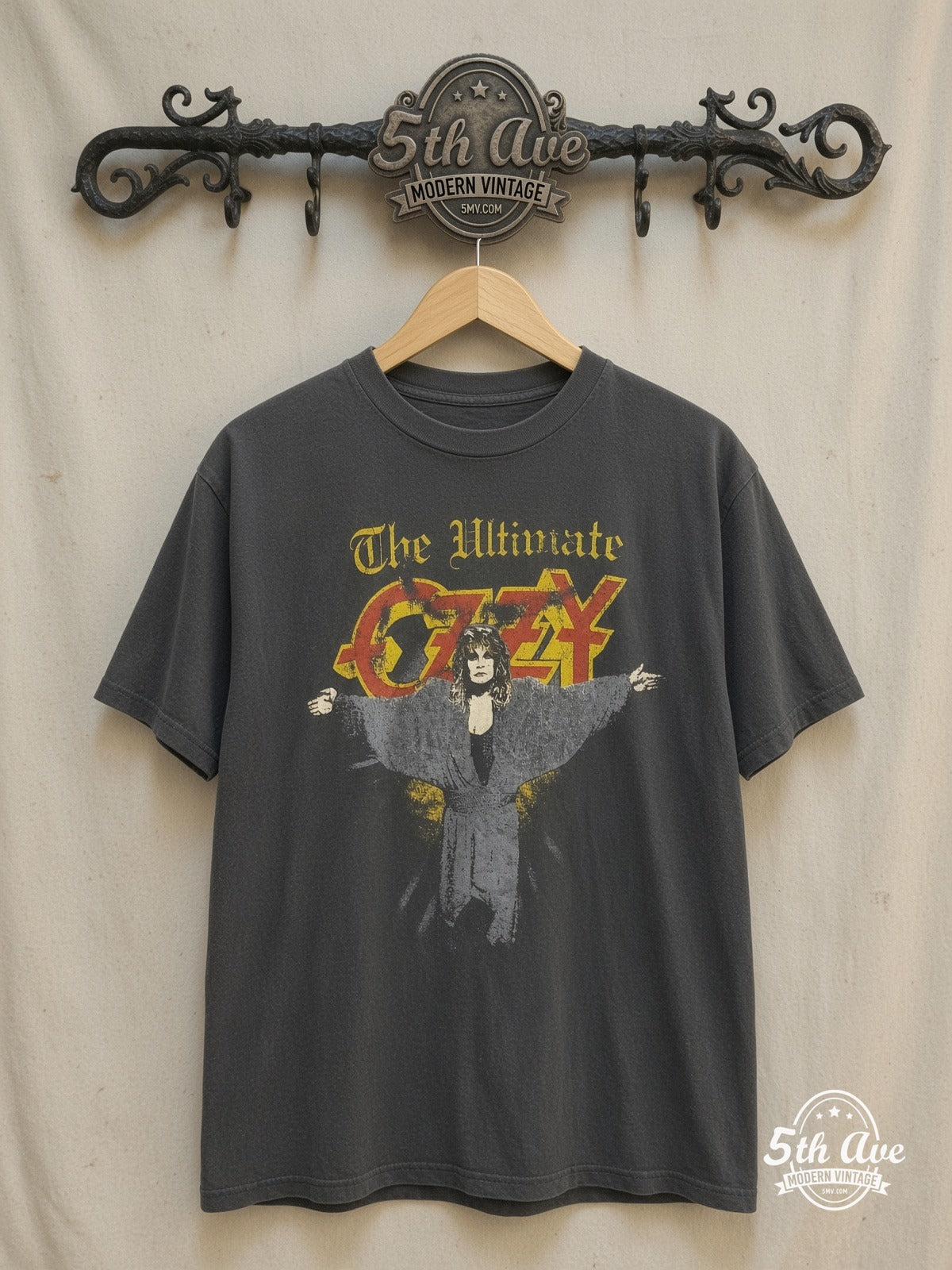 Ozzy Osbourne – The Ultimate – Vintage Band T-Shirt — front on locked cream ornate 5th Ave rack