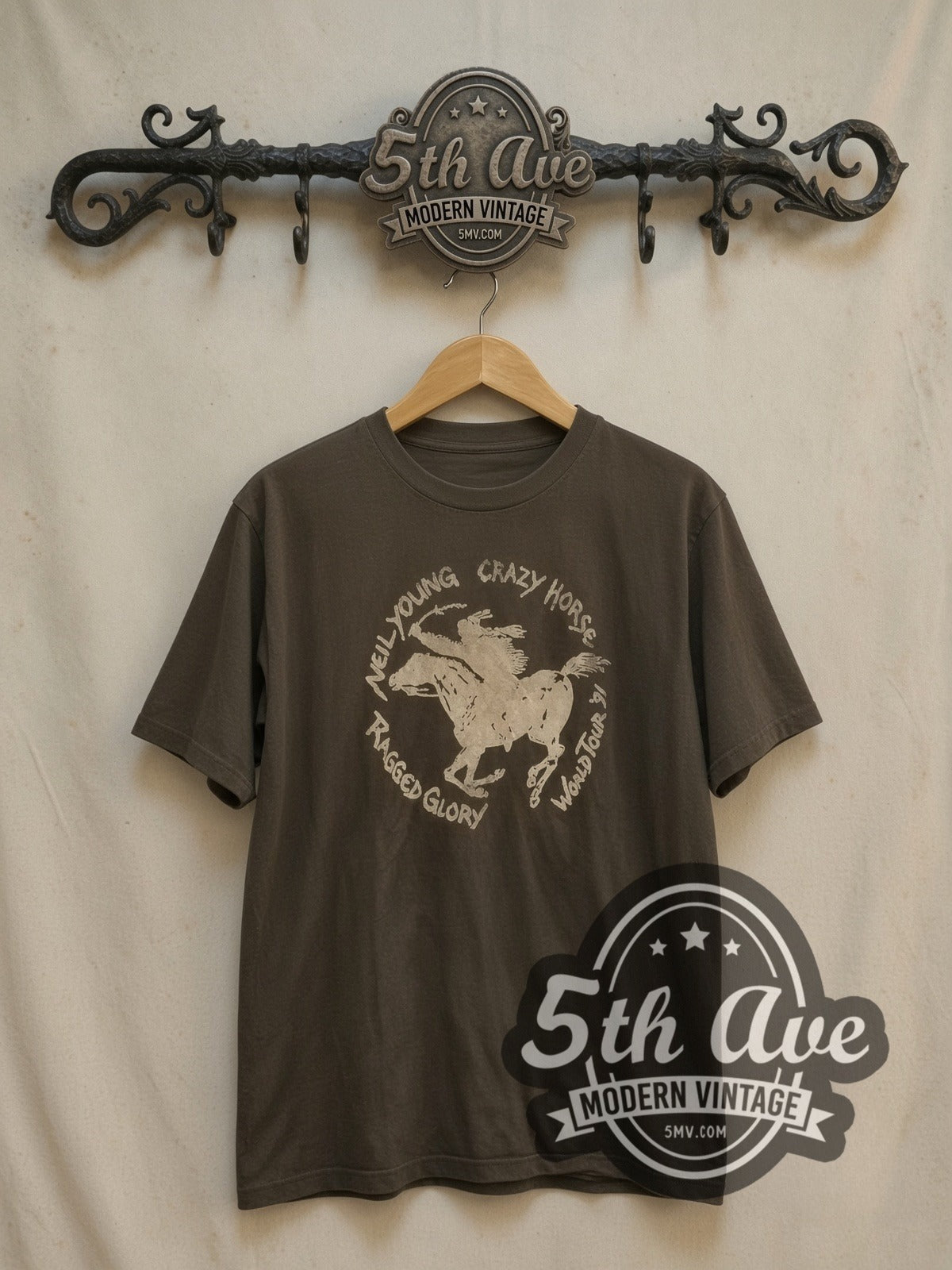 Neil Young Crazy Horse 'Ragged Glory World Tour '91 vintage band t-shirt, front view on a display rack