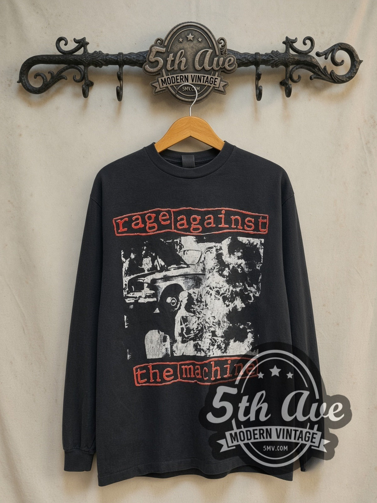 Rage Against the Machine Burning Monk I Won't Do What long sleeve vintage band t-shirt in black, front view on a display rack