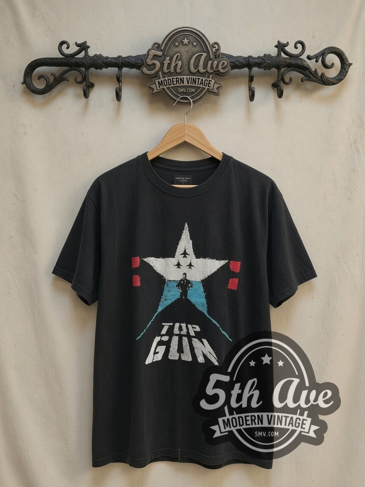 Top Gun Movie Poster vintage movie t-shirt, front view on a display rack