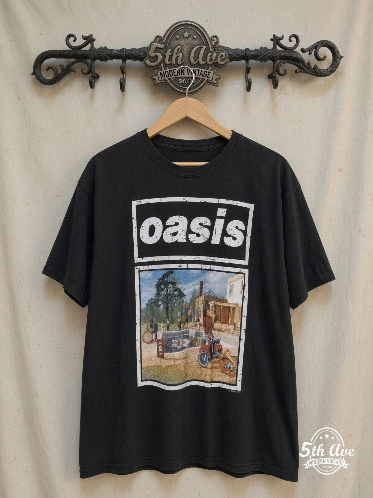 Oasis – Be Here Now – Vintage Band T-Shirt — front on locked cream ornate 5th Ave rack
