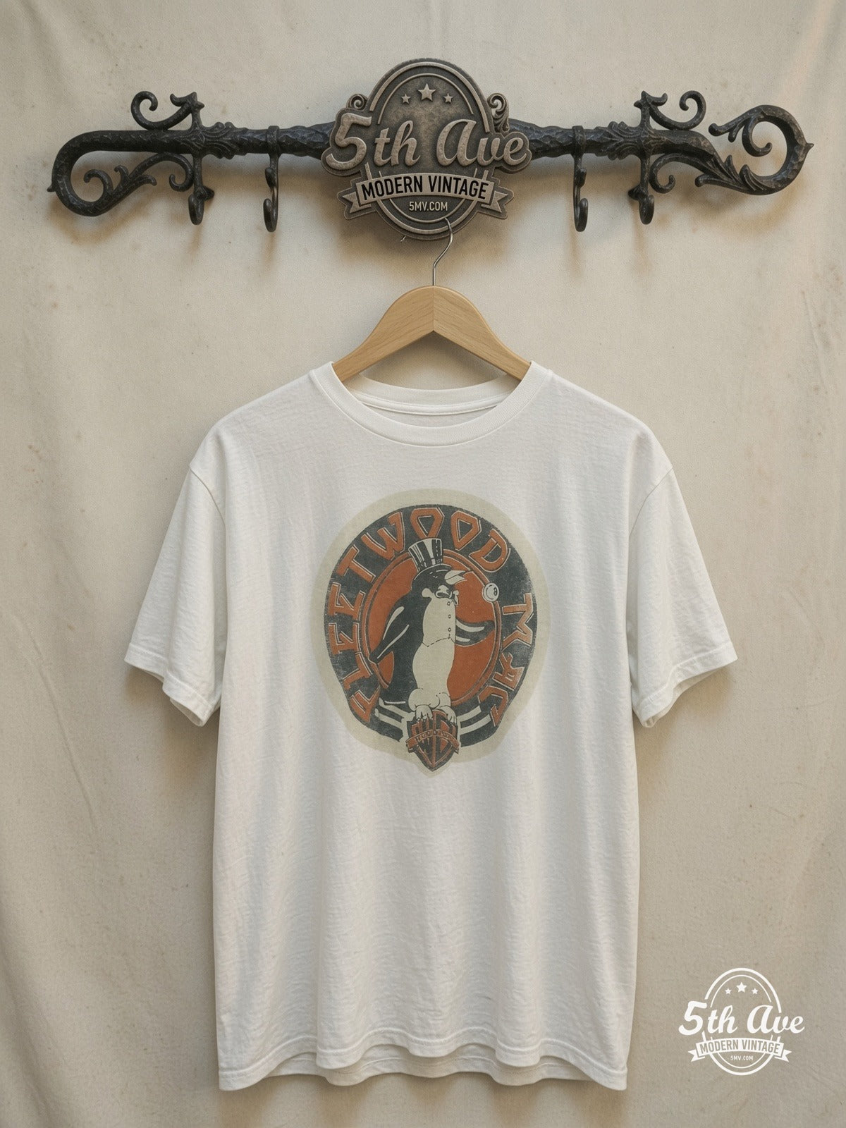 FLEETWOOD MAC 100% Cotton New Vintage Band T-Shirt – Vintage Band T-Shirt — front on locked cream ornate 5th Ave rack
