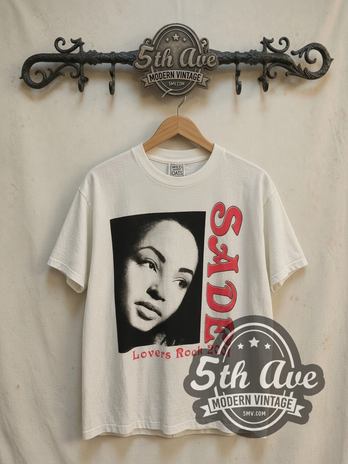 Sade Lover's Rock 2001 vintage band t-shirt, front view on a display rack