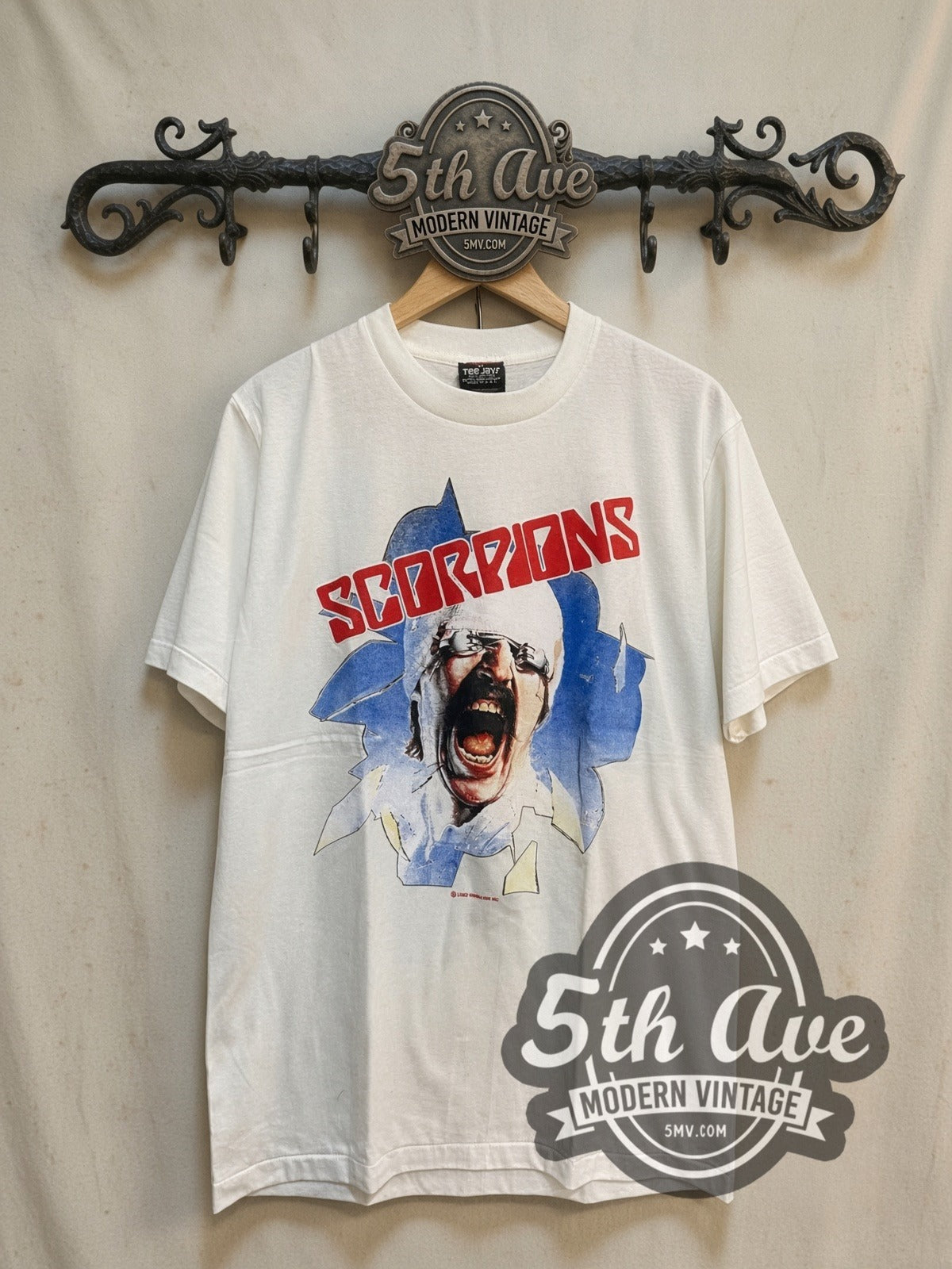 Scorpions the Final Sting 1987 vintage band t-shirt, front view on a display rack