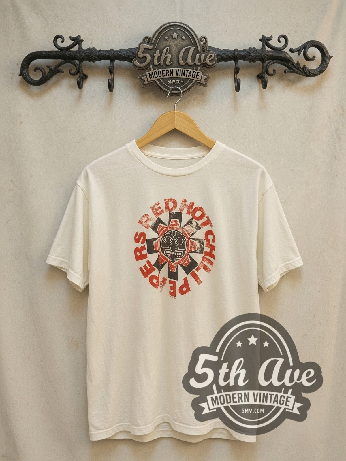Red Hot Chili Peppers Aztec Sun Asterisk Logo White vintage band t-shirt in white, front view on a display rack
