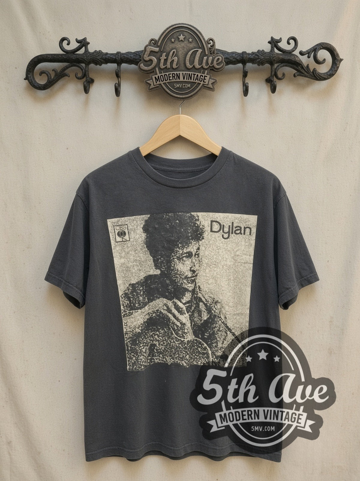 Bob Dylan Guitar Portrait vintage band t-shirt, front view on a display rack