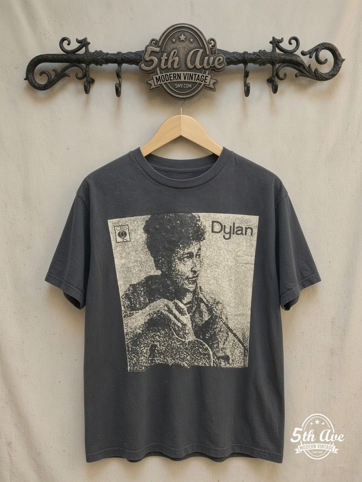 Dylan's Echo: Vintage Vibe Tribute Tee – Vintage Band T-Shirt — front on locked cream ornate 5th Ave rack