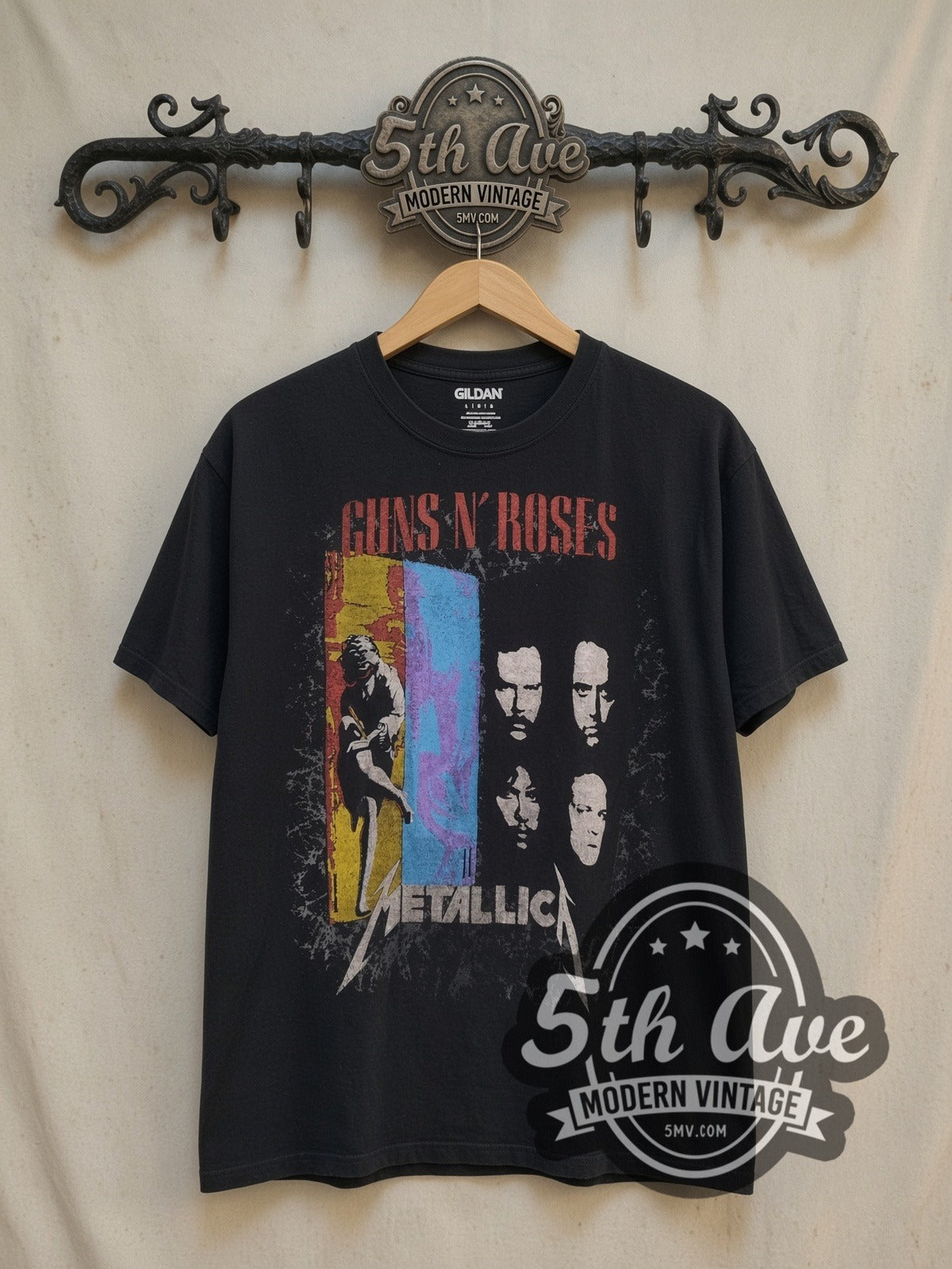Guns N' Roses and Metallica 1992 Stadium Tour vintage band t-shirt, front view on a display rack