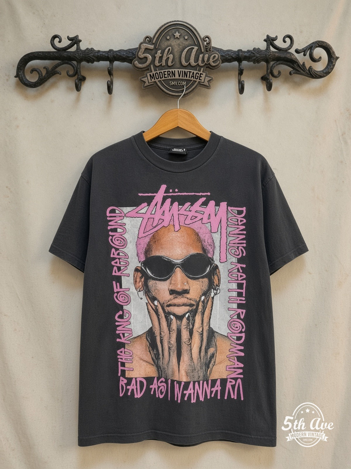 Dennis Rodman x Stüssy – The King of Rebound – Vintage Graphic Tee — front on locked cream ornate 5th Ave rack