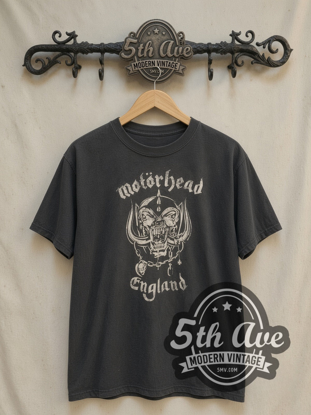 Motörhead Everything Louder Than Everything Else vintage band t-shirt, front view on a display rack