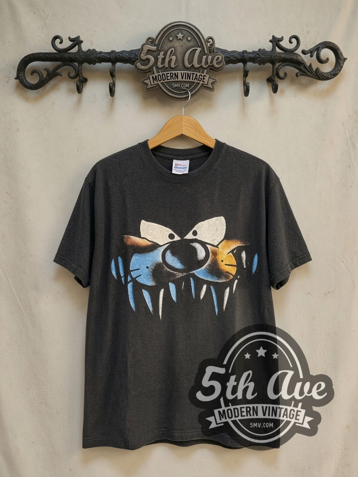 Looney Tunes Taz-Mania North Carolina vintage cartoon tee in black, front view on a display rack