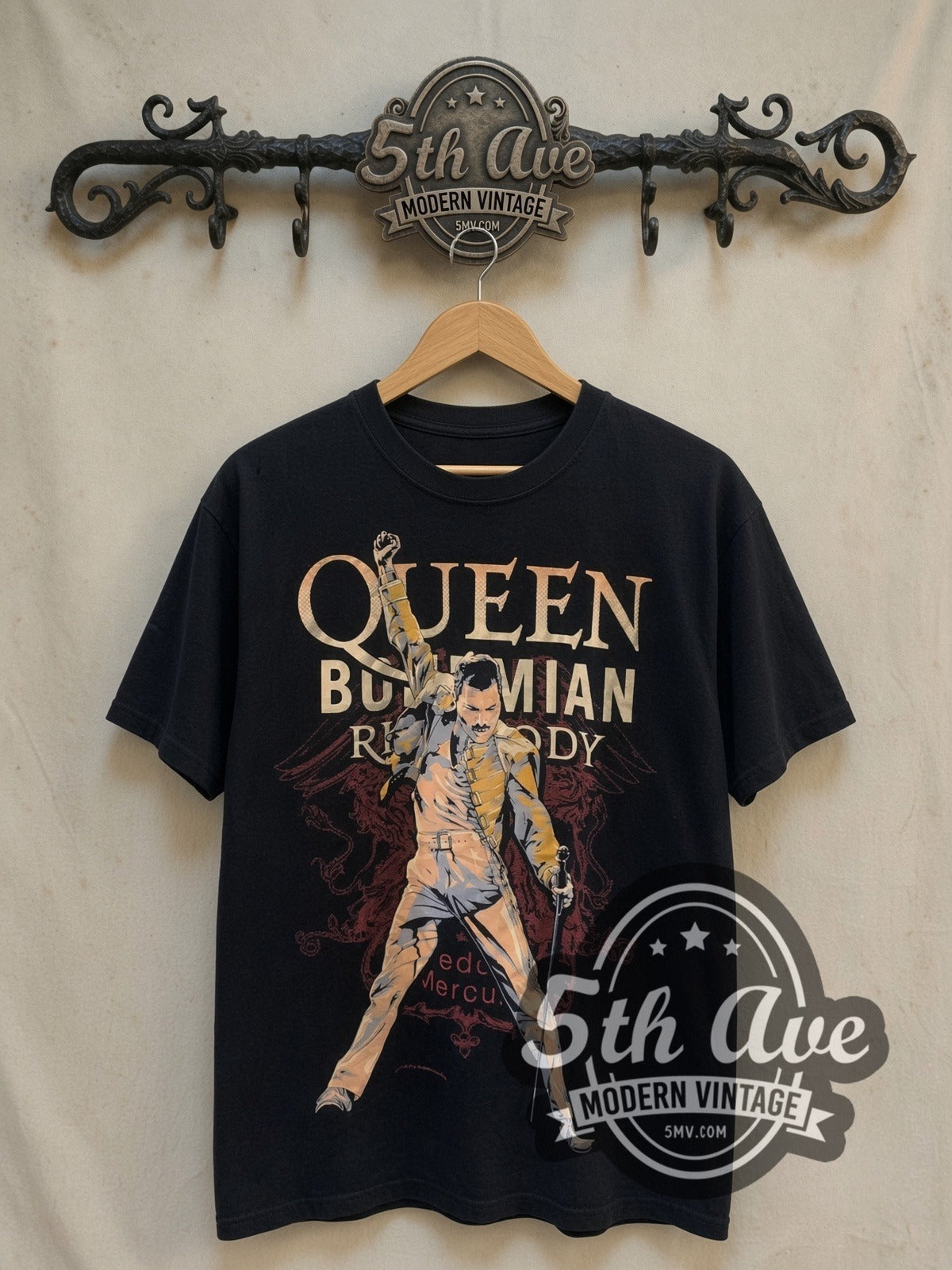 Queen Bohemian Rhapsody Freddie Yellow Jacket vintage band t-shirt, front view on a display rack