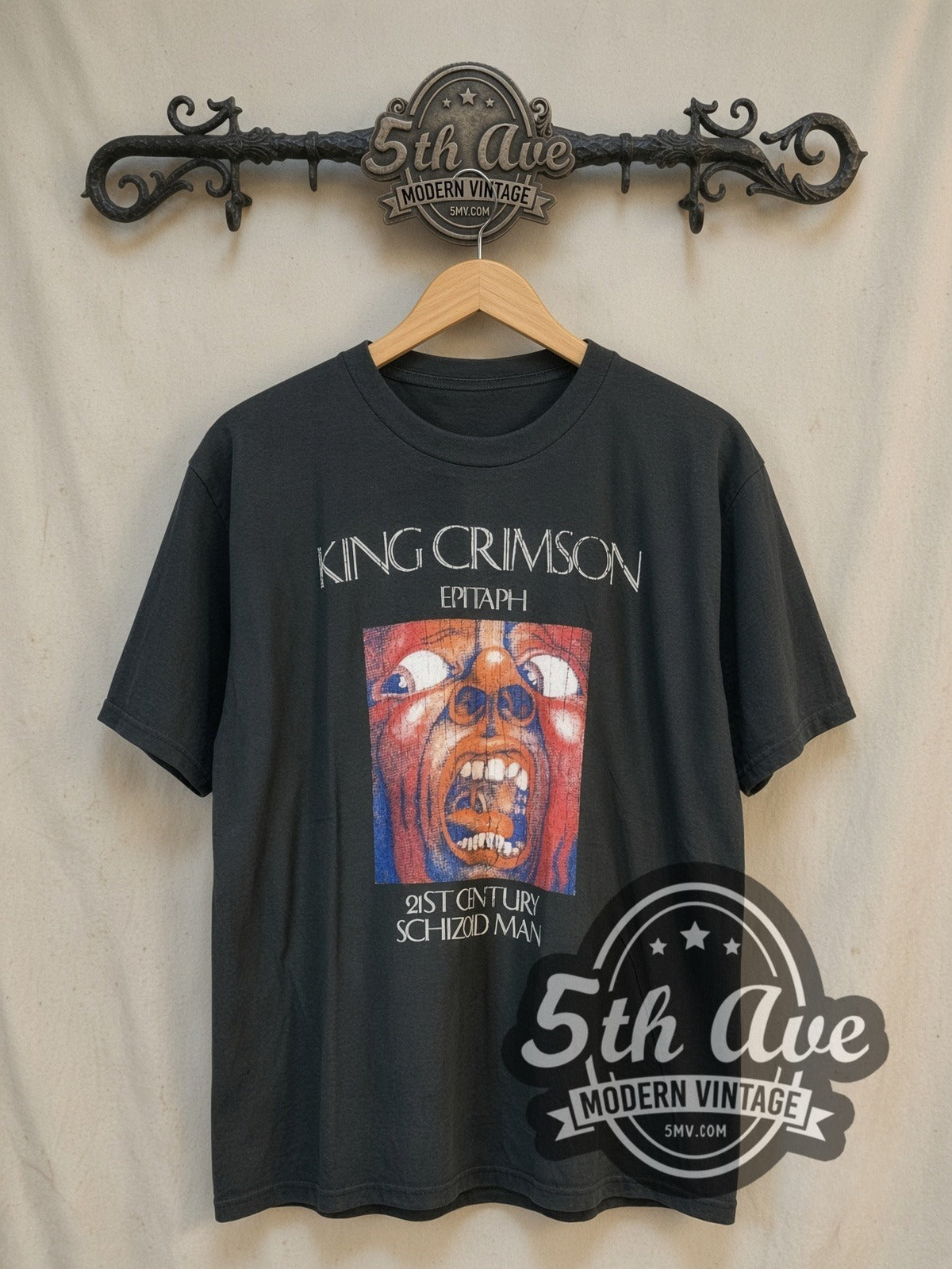 King Crimson Epitaph Schizoid Man Washed vintage band t-shirt in black, front view on a display rack