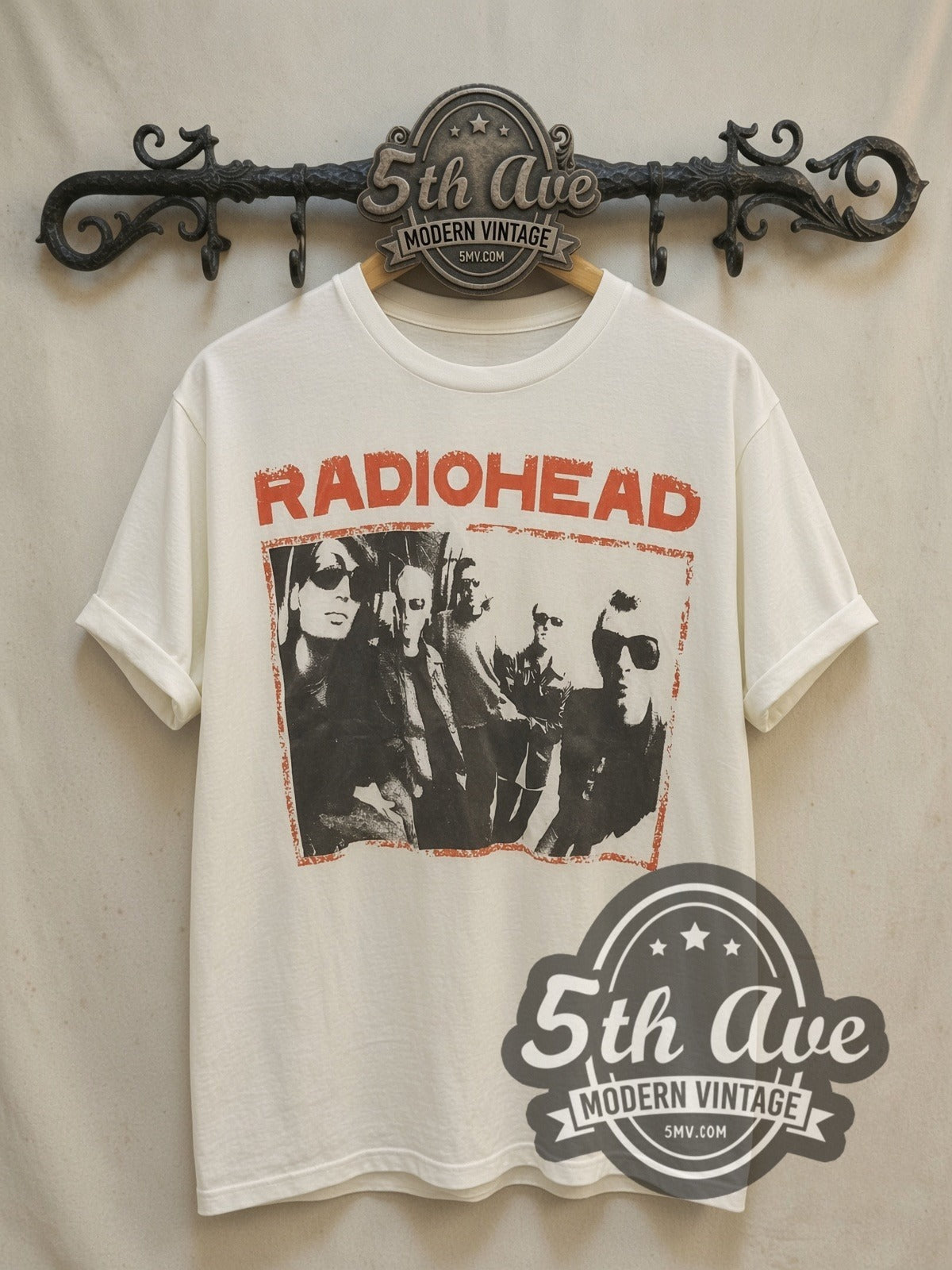 Radiohead Sunglasses Band Photo Red Border White vintage band t-shirt, front view on a display rack