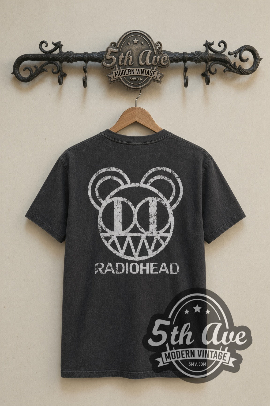 Radiohead Pablo Honey Bear Logo band t-shirt in black, back view on a display rack