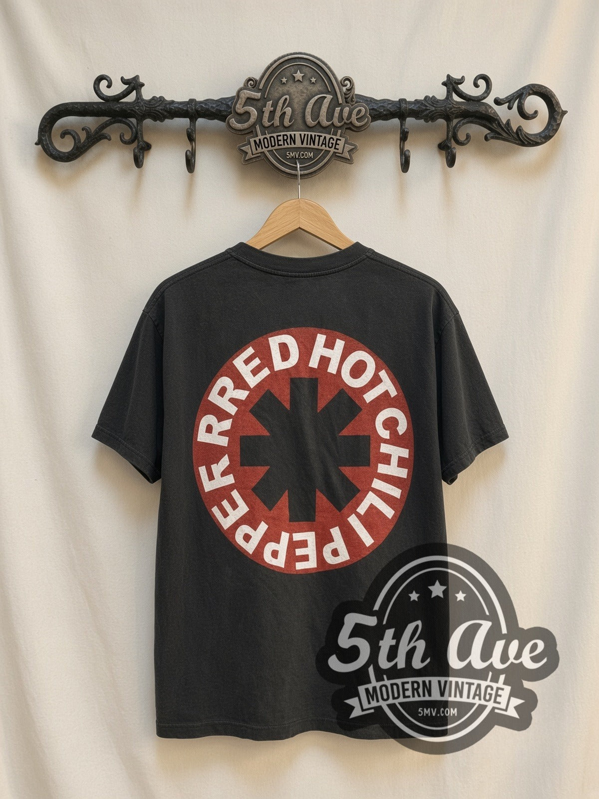 Red Hot Chili Peppers 1991 Caricatures / Asterisk vintage band t-shirt, back view on a display rack