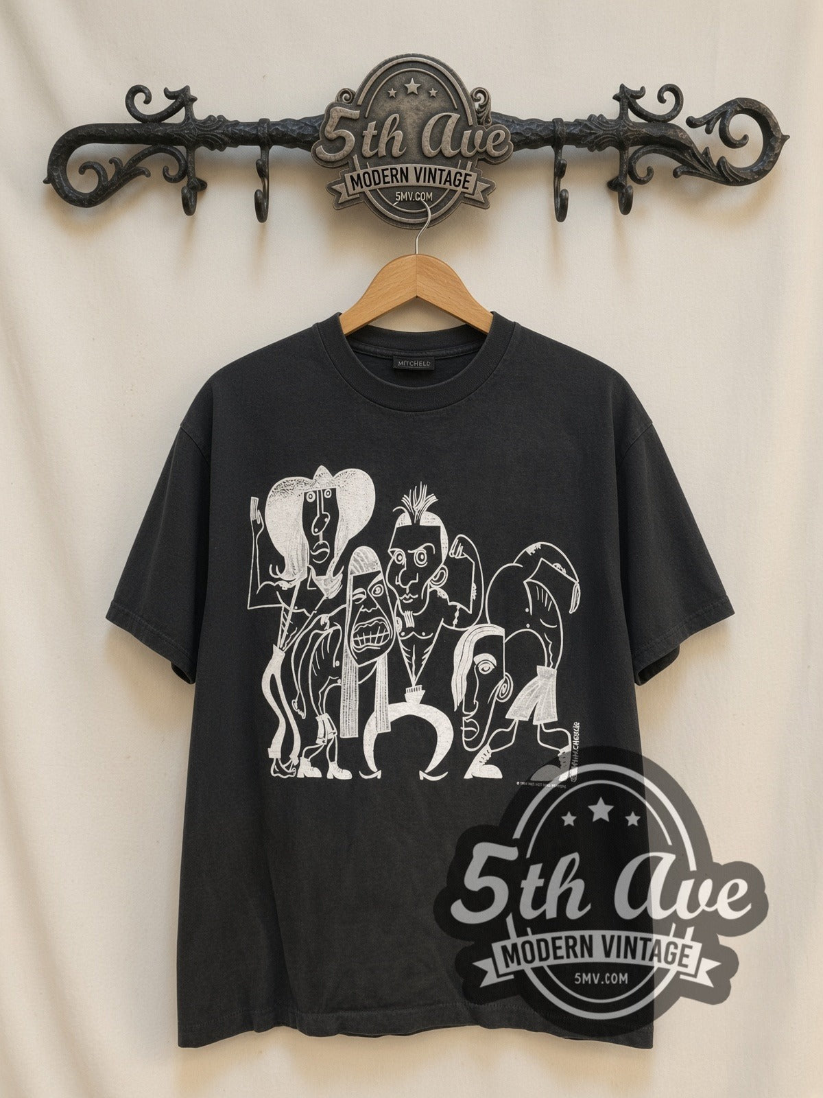 Red Hot Chili Peppers 1991 Caricatures / Asterisk vintage band t-shirt, front view on a display rack