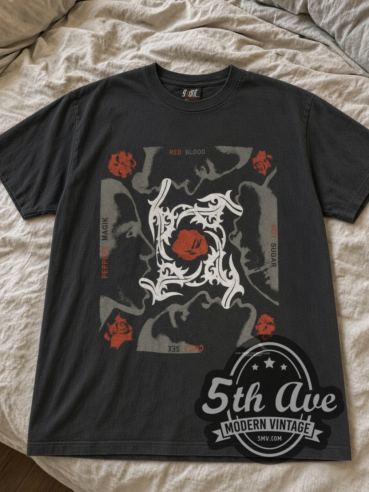 Faded black Red Hot Chili Peppers Blood Sugar Sex Magik Asterisk Circle tee laid flat on linen bed