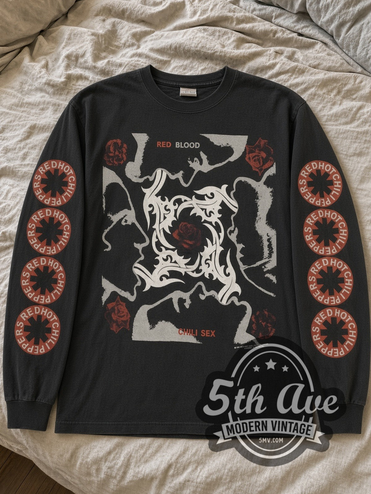 Black RHCP Blood Sugar Sex Magik long sleeve laid flat on linen bed