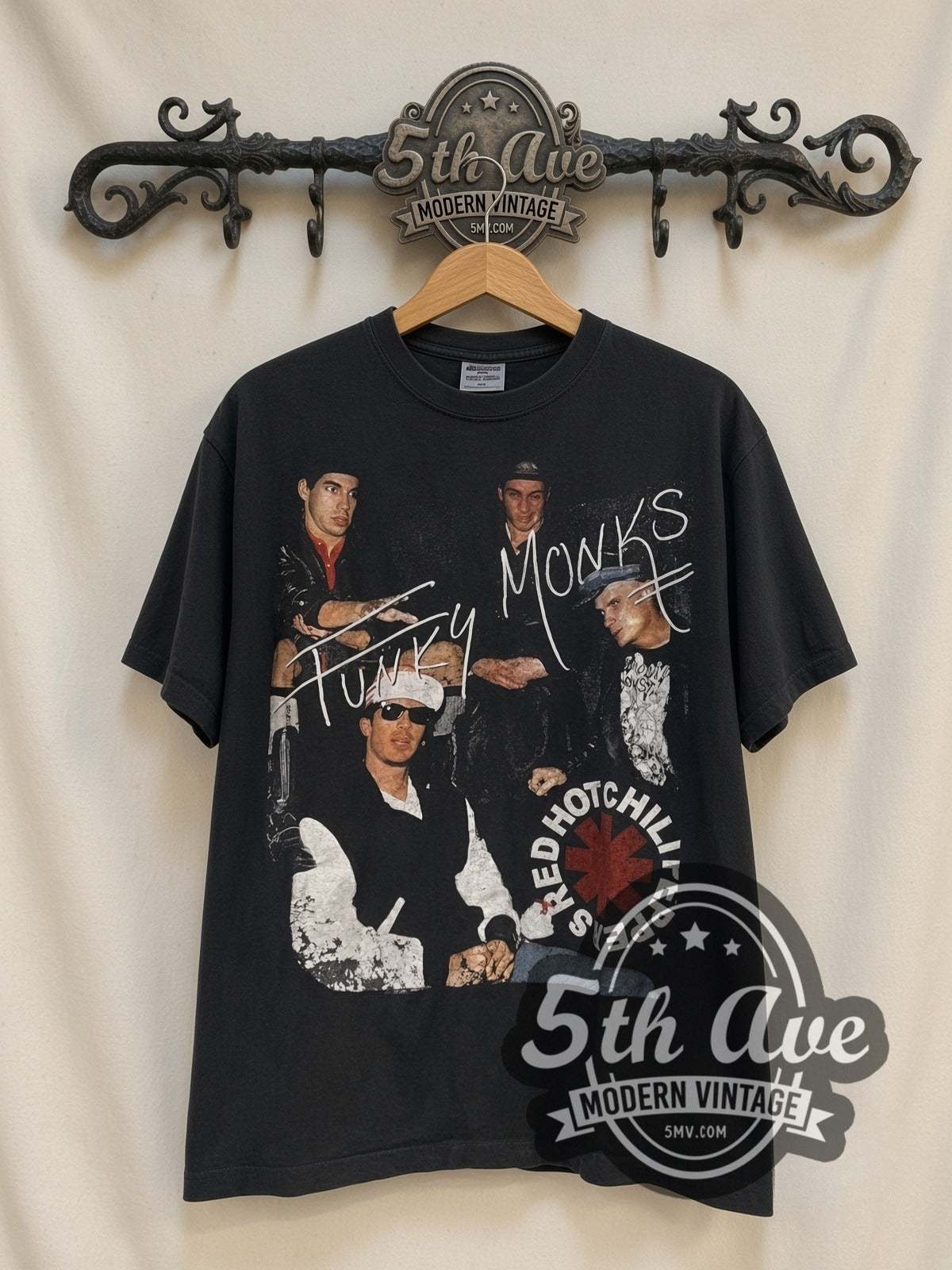 Red Hot Chili Peppers Funky Monks / Greatest Hits vintage band t-shirt, front view on a display rack