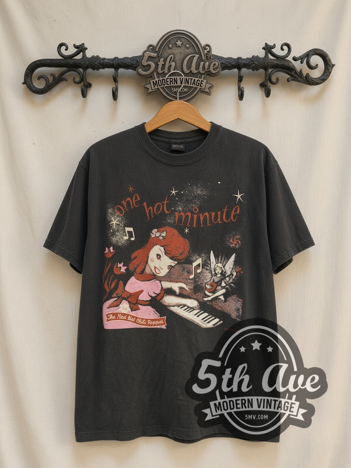 Red Hot Chili Peppers One Hot Minute 1995 vintage band t-shirt, front view on a display rack