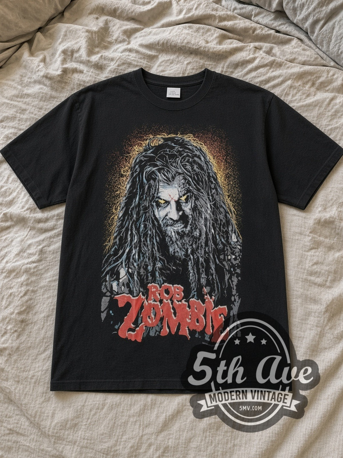 Black Rob Zombie Vintage Band T-Shirt laid flat on a linen bed