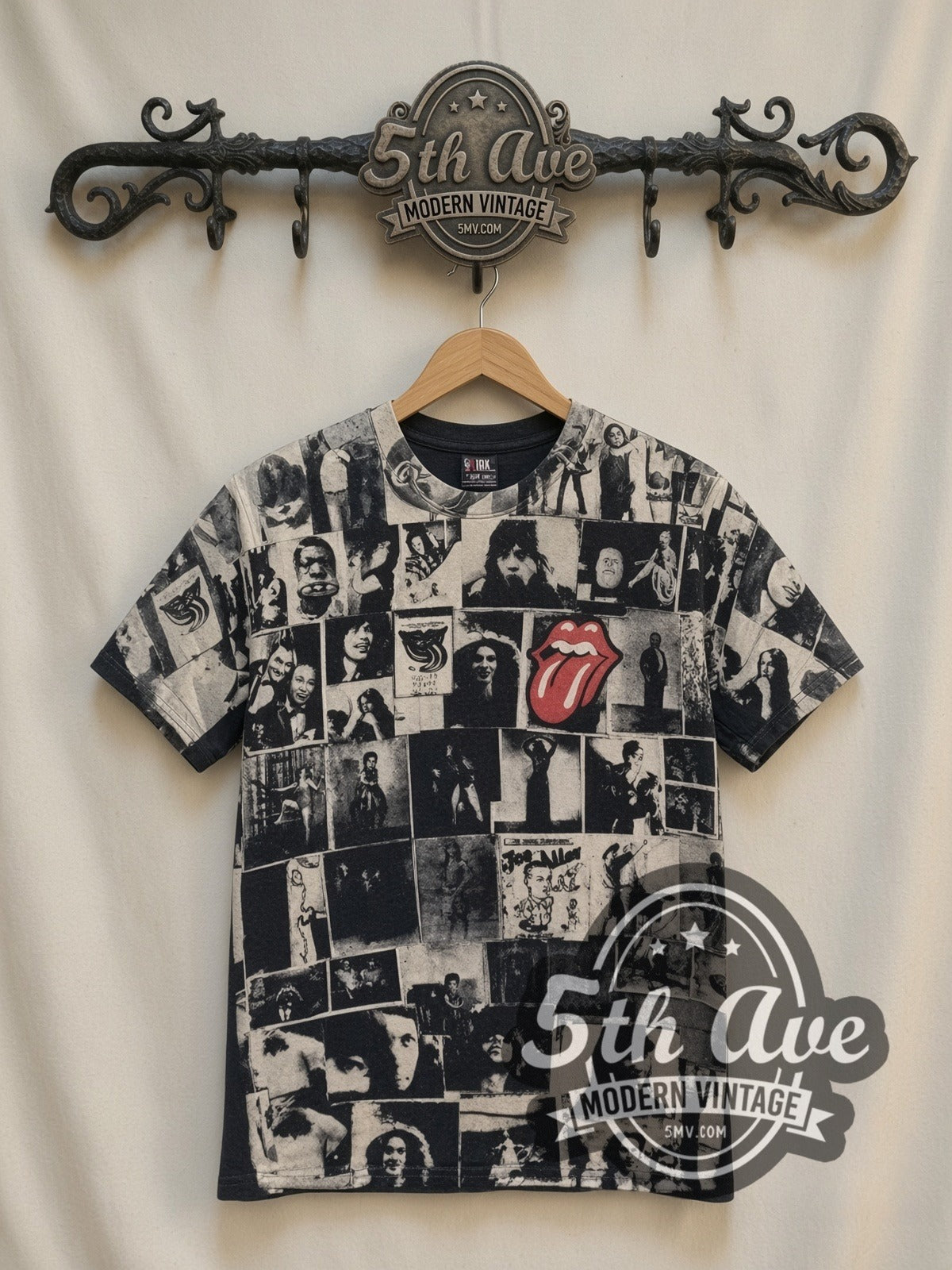 The Rolling Stones Exile on Main St Collage all-over-print vintage band t-shirt, front view on a display rack