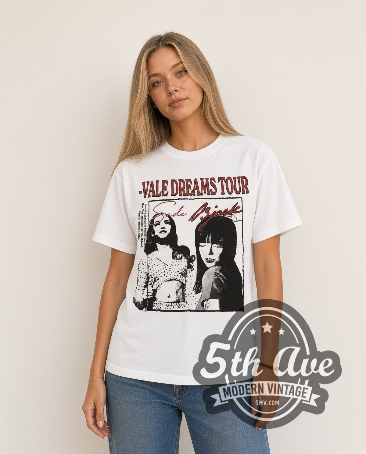 Woman wearing white Sade and Bjork Vale Dreams Tour vintage band t-shirt