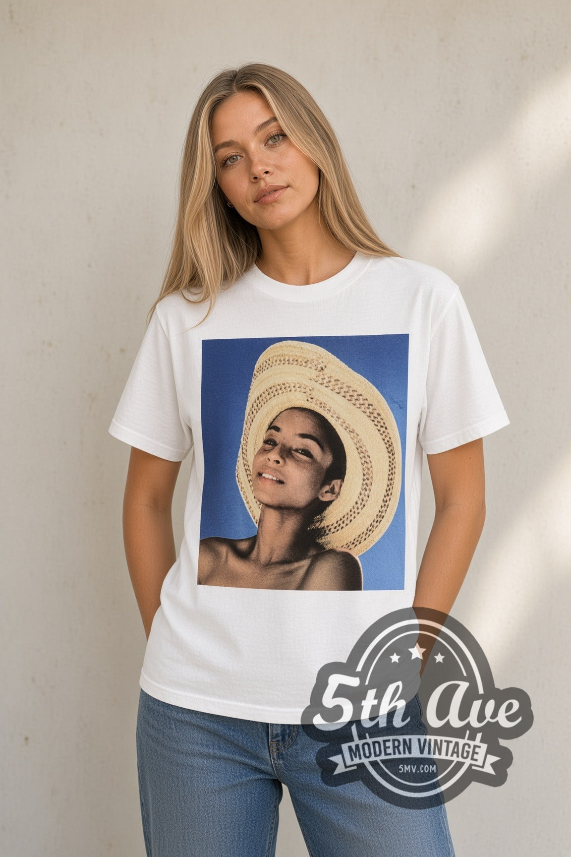 Woman wearing white Sade Stronger Than Pride vintage band t-shirt