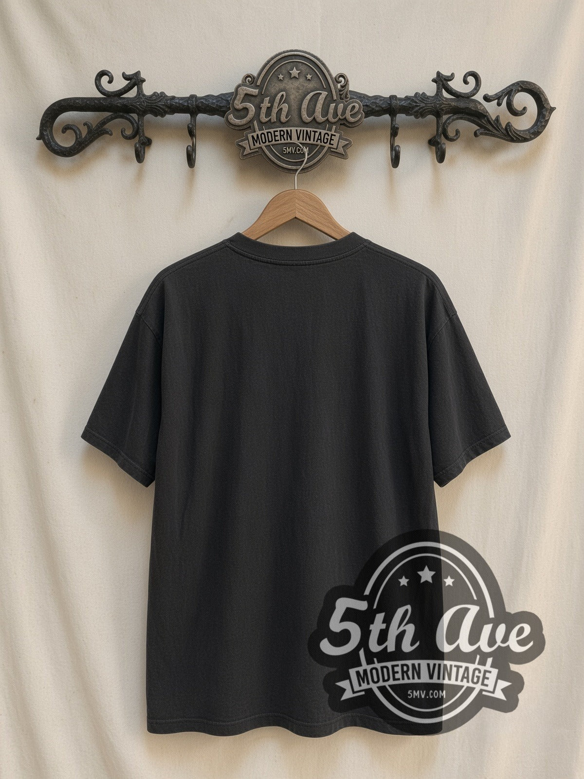 Sailor Moon Wand Portrait Blue vintage graphic t-shirt, back view on a display rack