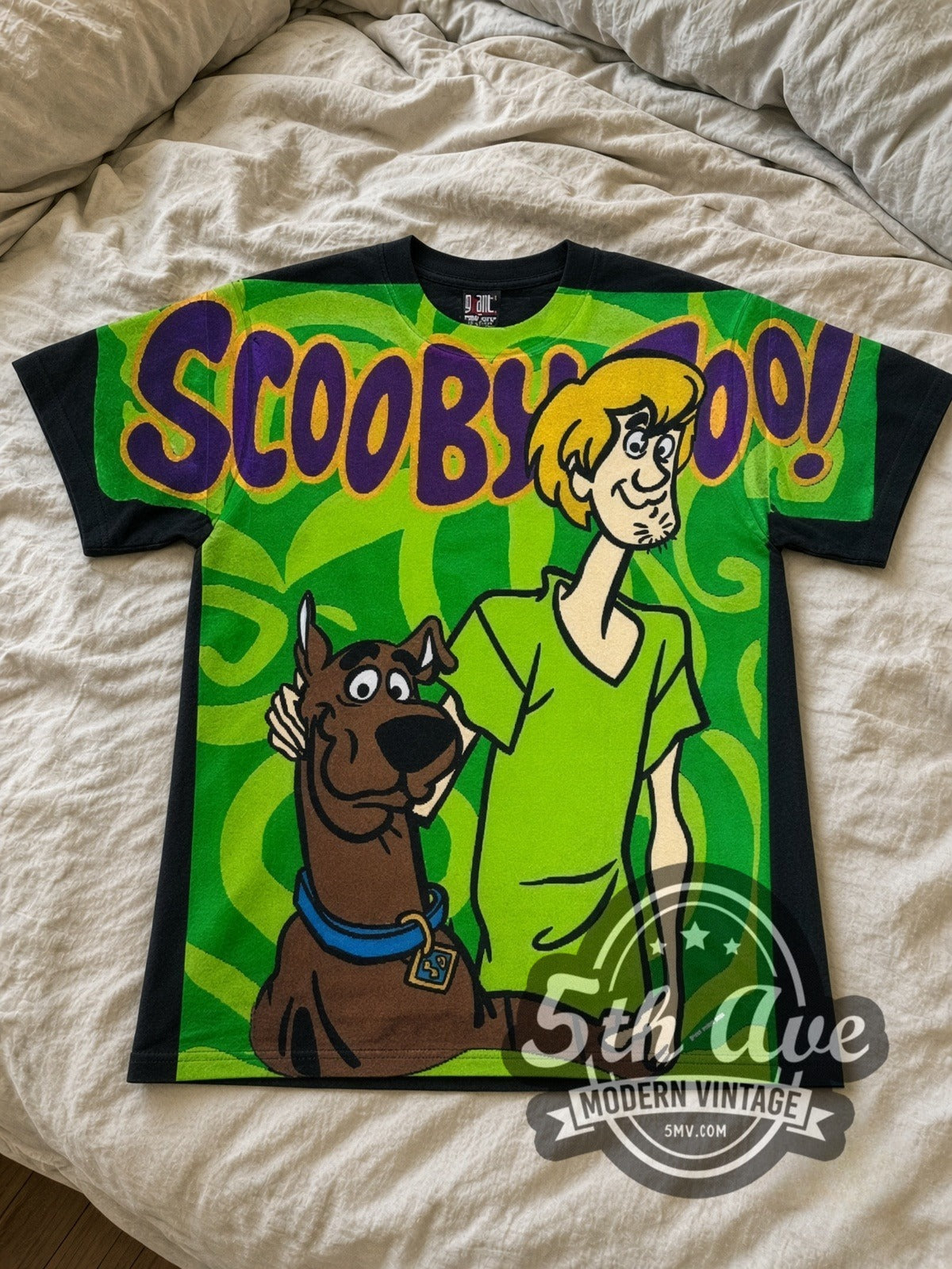 Scooby-Doo Scooby & Shaggy Green Swirl all-over-print vintage cartoon tee in green laid flat