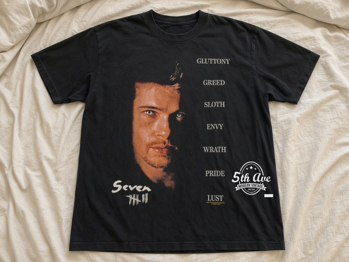 Se7en Seven Deadly Sins vintage t-shirt laid on bed