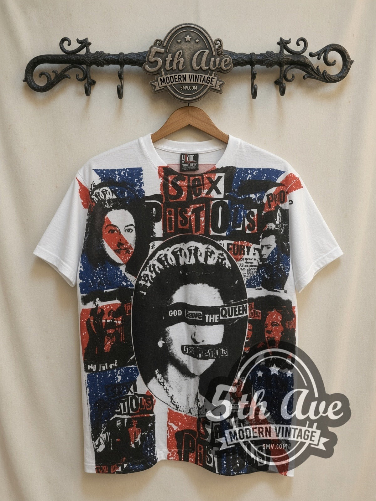 Sex Pistols God Save the Queen all-over-print vintage band t-shirt in white, front view on a display rack
