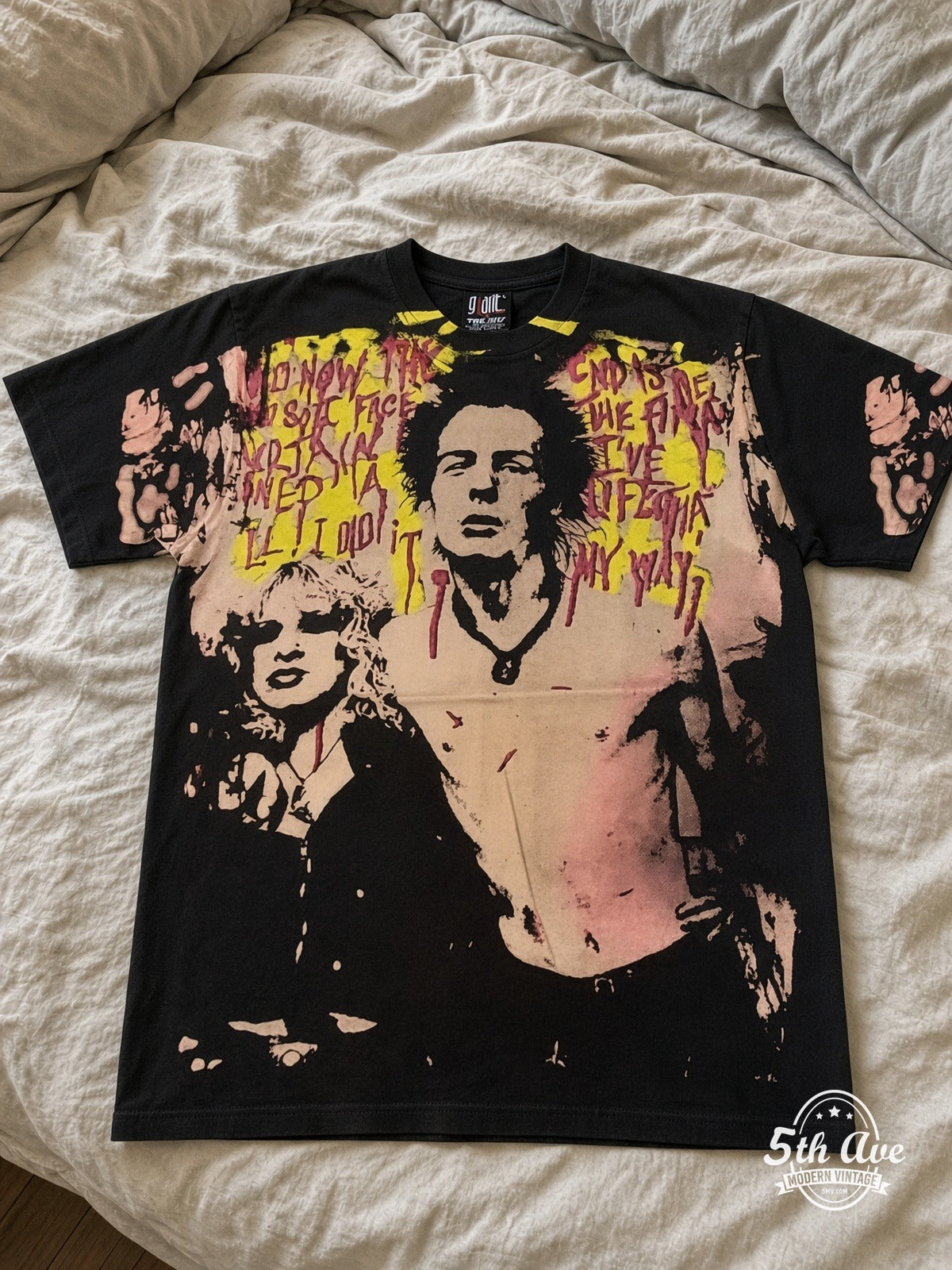 Sex Pistols Sid Vicious Nancy Spungen all over print vintage tee laid on bed