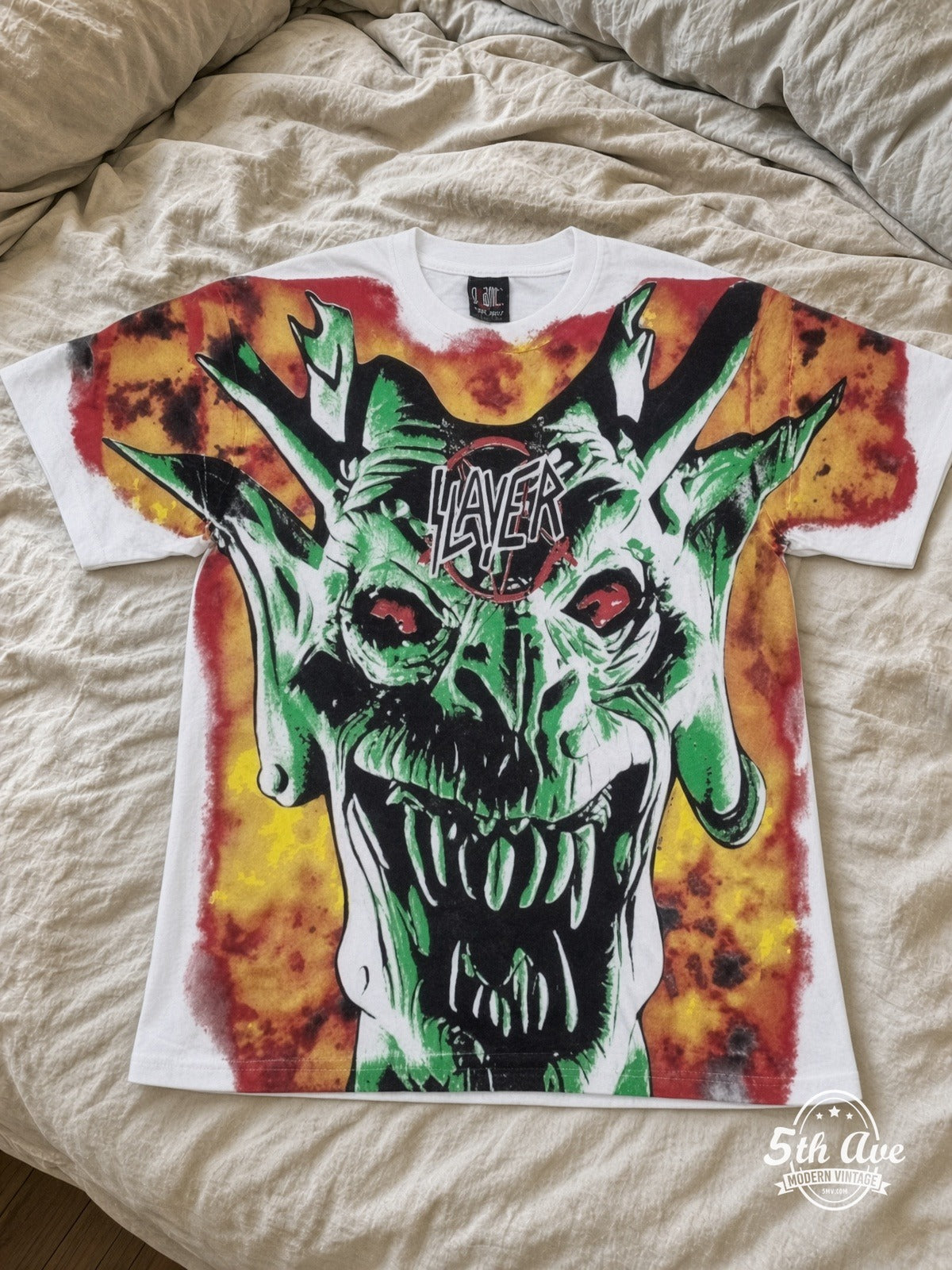 Slayer Demon Flames White all over print vintage tee laid on bed