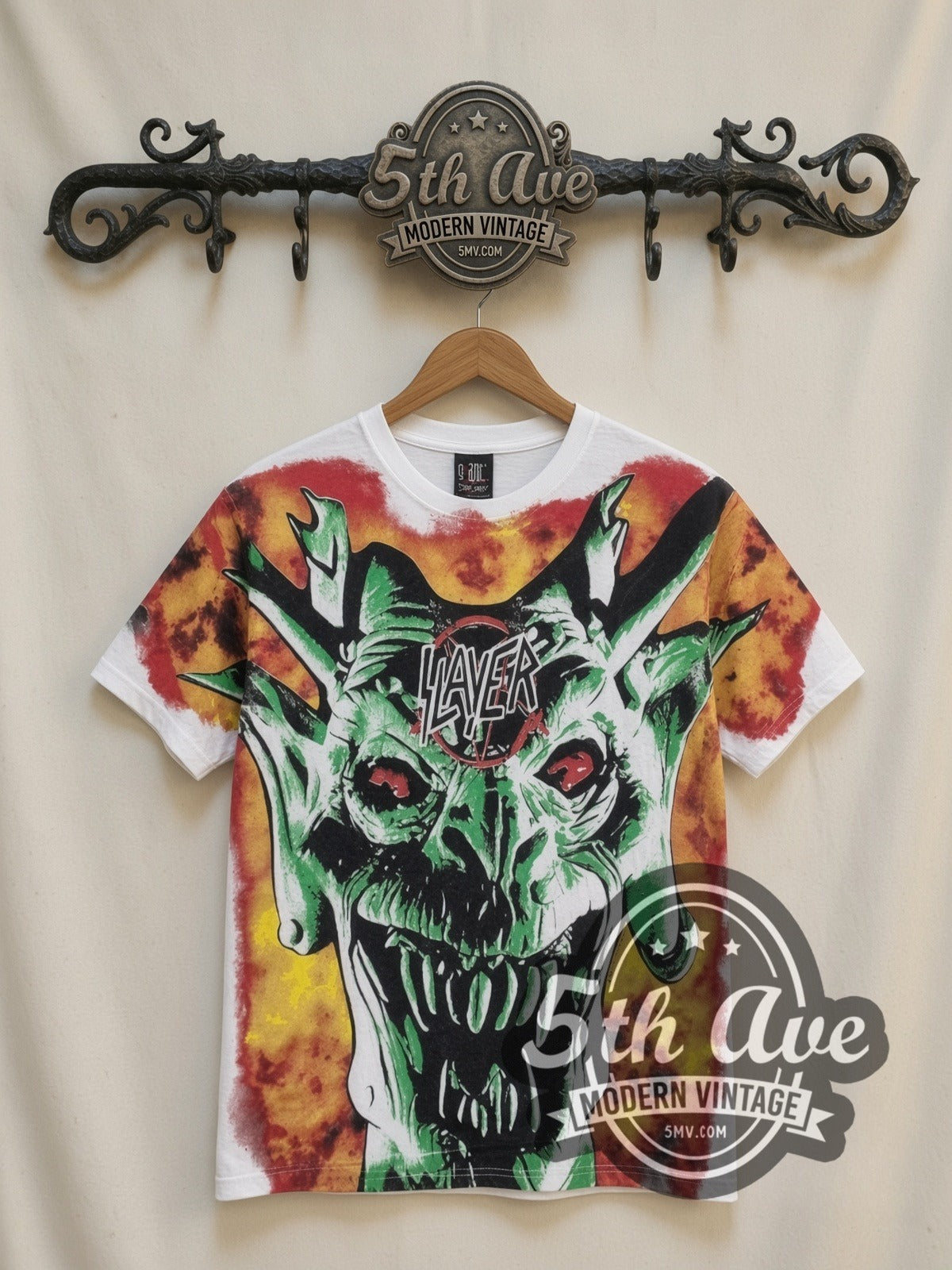 Slayer Demon Flames all-over-print vintage band t-shirt in white, front view on a display rack